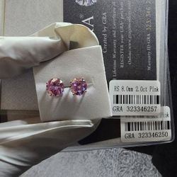 These 925 silver earrings feature 2 pink Moissanite diamond