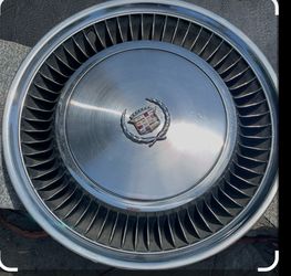 1973 factory 15 inch Cadillac hubcaps(4)