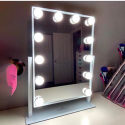 XL impressions vanity mirror. tri color