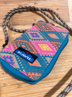 KAVU Go Time Bi-Fold Crossbody Wallet in a colorful geometric print with detachable KAVU rope strap.