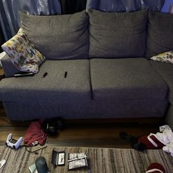 Comfortable gray sectional with chaise lounge