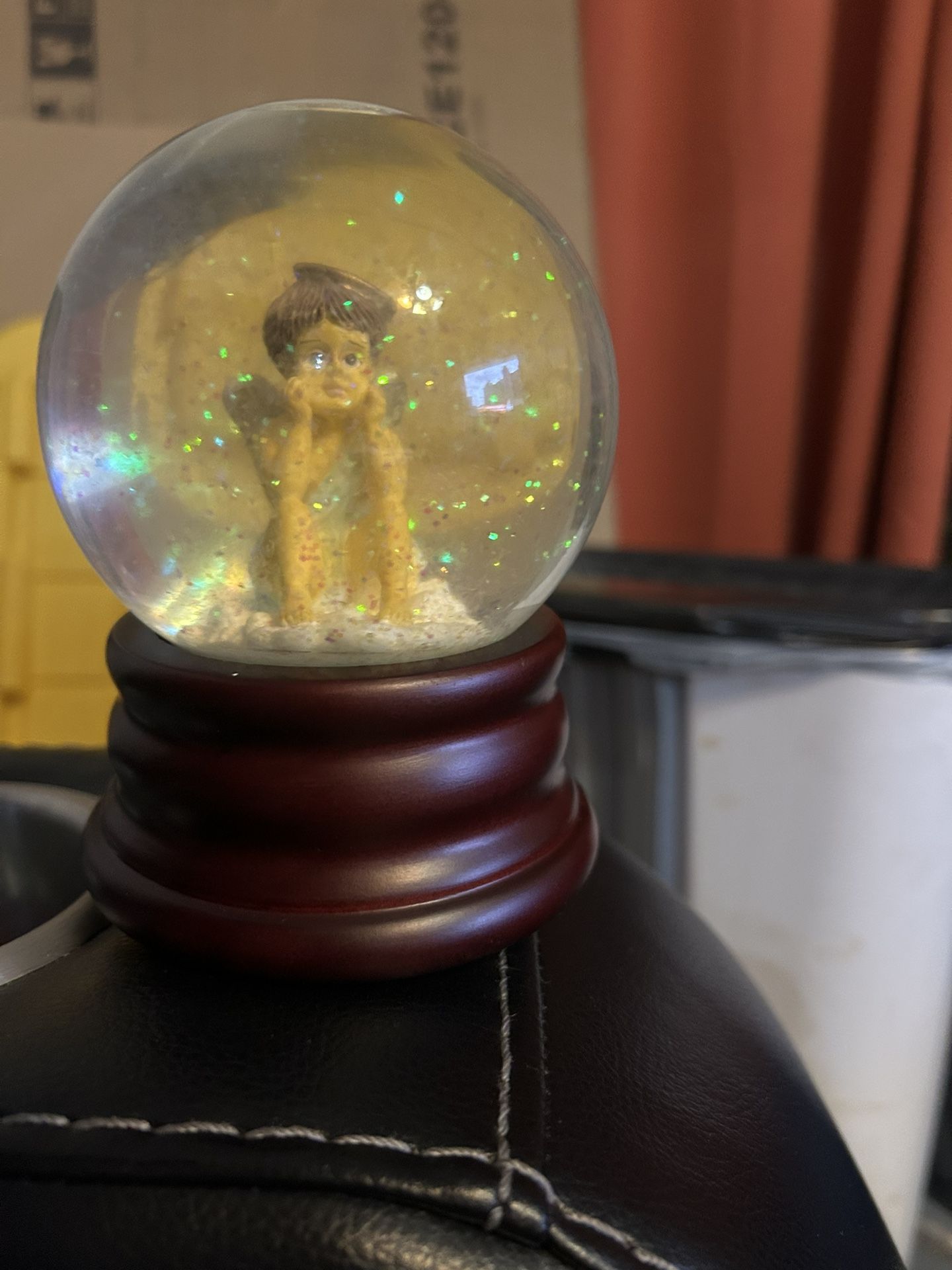 Angel snow globe
