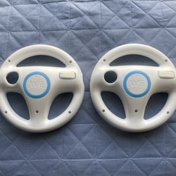 Wii Steering Wheels ( 5 Dollars Each )