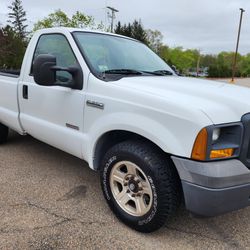 2005 Ford F350 Super Duty 6.0 Diesel 2WD with 64k and 8ft bed.