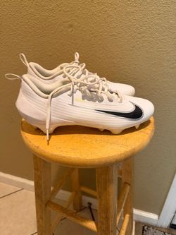 White Nike cleats  9.5
