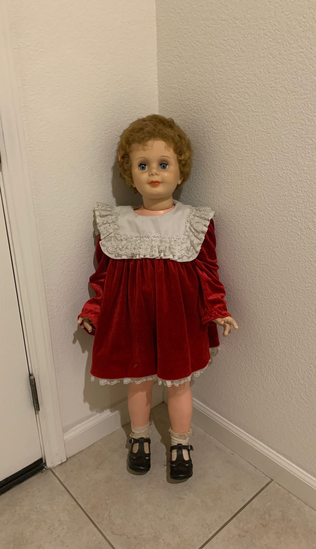 Old doll three feet tall,