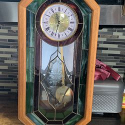 Beautiful solid oak Stainglass clock with pendulums
