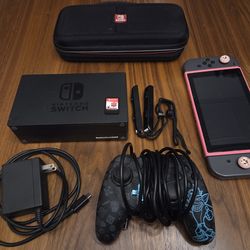 Excellent condition Nintendo Switch with Case, Pokémon Shield & 128gb SD Card & TV dock plus extra controller plus extra joycons
