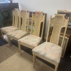 Set of 4 Regency style dining chairs feature a faux bamboo frame