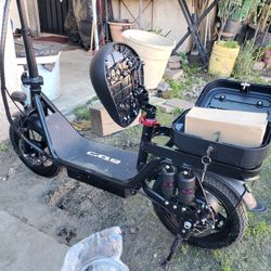 Brand New Conditions Ebike Electric Bike Scooter 25mph 40miles range. Has cargo Box. All brand New Conditions. $600! Or Trade PS5 OR SWITCH 2 OR PSA 1