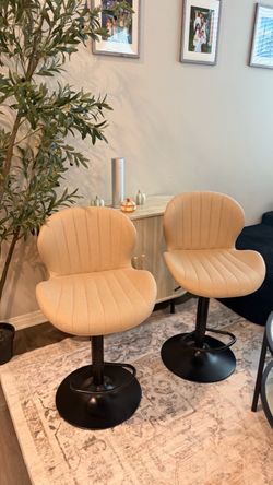 Pair of swivel bar stools