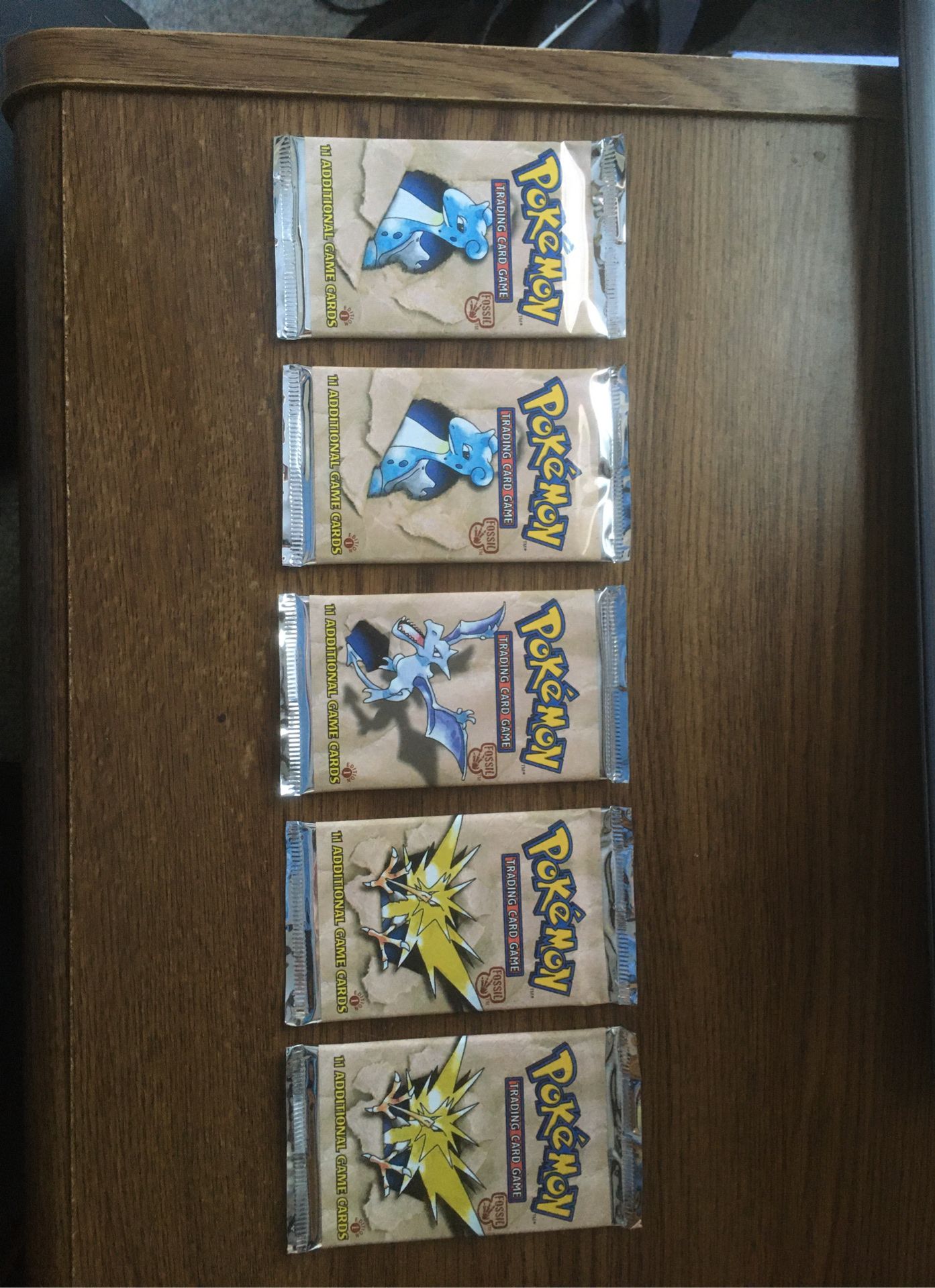 Unweighed 1st Edition Pokemon Fossil Packs