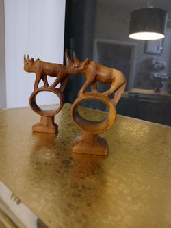 2 hand Carved wood Rhinoceros napkin rings