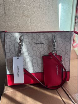 Calvin Klein monogram tote bag in cream and red with a matching chain strap coin pouch.