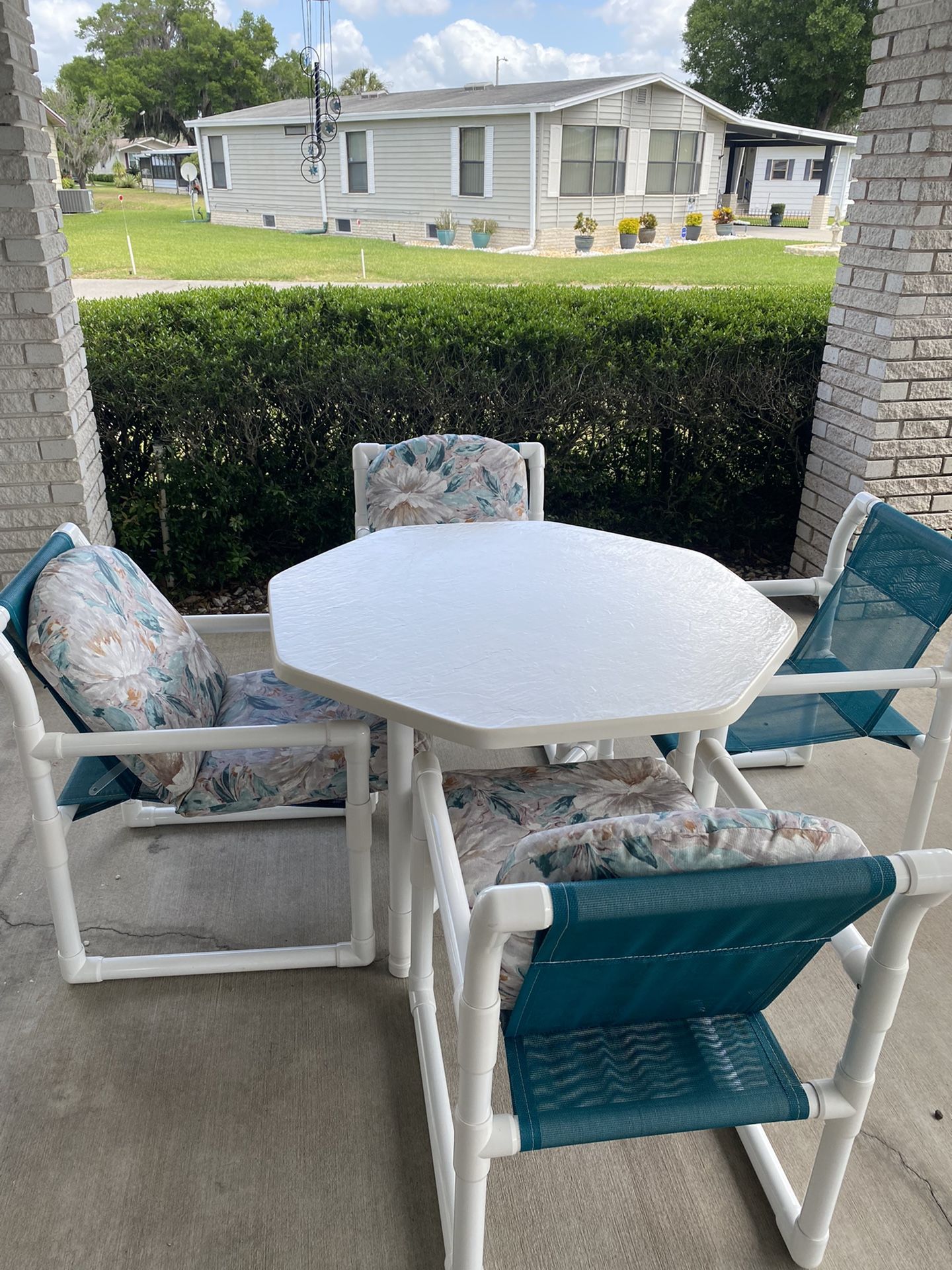PVC Table And 4 Chairs Like New