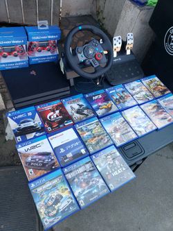 17 New Great Games X $20! Each = $340!. & $250! Racing Kit. $200! 2020 Playstation 4 PS4 Pro 1TB & $40! Extra control =830 all so $700! Firm all Or Tr