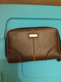Brown wallet with lots of compartments, new never use.