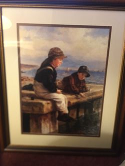 Boys fishing off dock