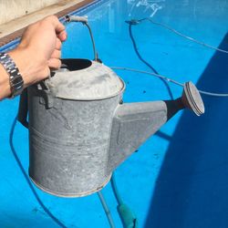 galvanized watering can