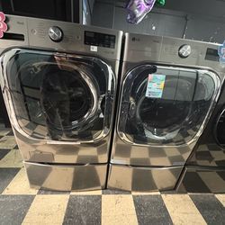LG ThinQ jumbo washer and dryer with pedestals