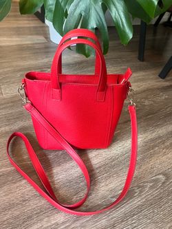 Vintage Estée Lauder red faux leather bag