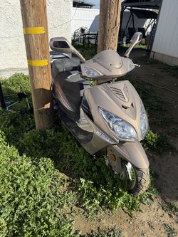 Scooter like new only 7 miles on it.