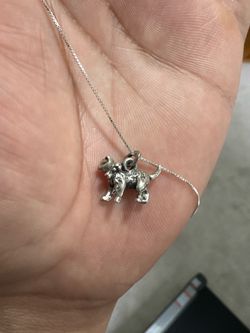 Silver necklace and cat pendant