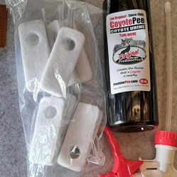New bottle of PredatorPee 100% Pure Coyote Urine with scent tag dispensers,