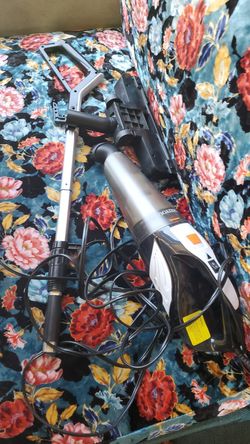 Vacuum cleaner. Hand held with atfachments
