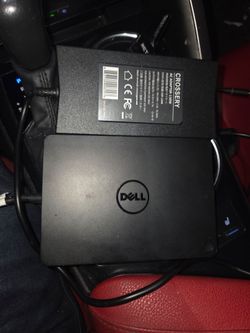 Dell K17a laptop dock with charger.