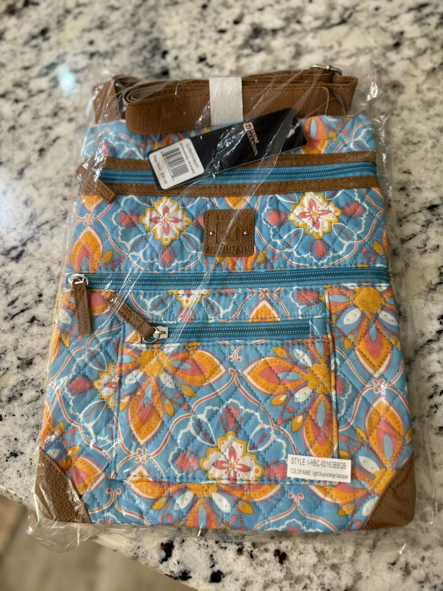 Crossbody bag, brand is stone Mountain