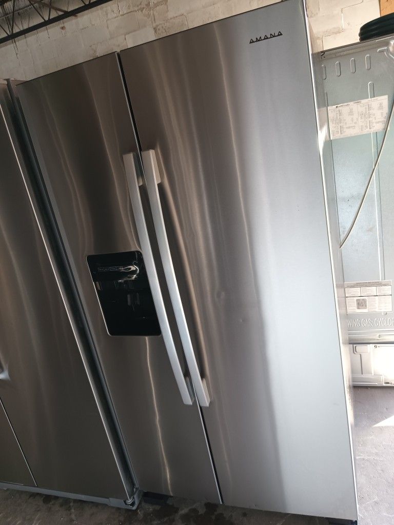 Amana  Refrigerator Side By Side Stainless Steel Everything Works Good 