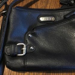 Rosetti Mini Black Crossbody Bag With A Front Buckle Feature