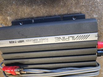 Alpine car amp and subwoofer.
