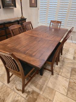8 piece dining table including 12" leaf