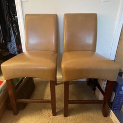 2 Tan Counter Stools