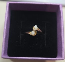 Vintage

Jonte 14K Gold Opal and Diamond Bypass Ring size 5
