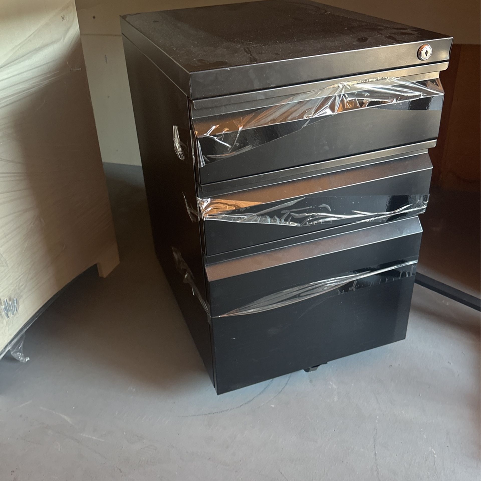 Black three drawer filing cabinet