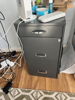 Steelcase gray three-drawer office cabinet