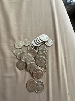 Roll of 1964 silver quarters