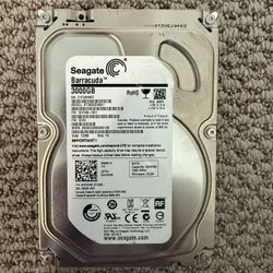 Brand: Seagate Barracuda 	•	Model: ST3000DM001 	•	Capacity: 3TB (3000GB) 	•	Interface: SATA 	•	Speed: 7200 RPM 	•	Form Factor: 3.5” (Desktop HDD)