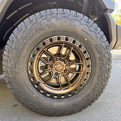 Arena Hustle Smoked Bronze Satin Black Lip Wheels 285|70R17 Falken Wildpeak AT4W Tires Package Deal