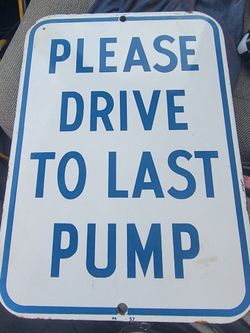 Please Drive To Last Pump Sign