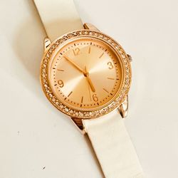 Rose gold watch women. White Faux Leather. Barely used. Comes from a smoke free environment.  