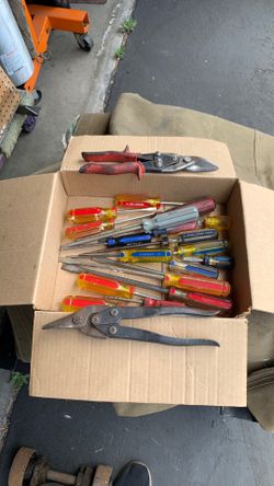 Assorted Screw Drivers and Tin Snips
