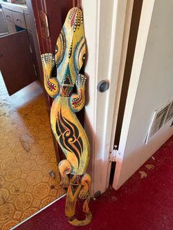 CROCODILE 6"w x 39"tall; cross streets are Arapaho & Waterview