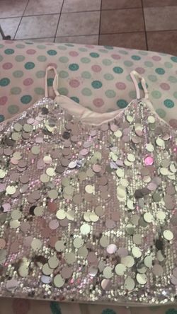 It’s a tank top, silver decorations