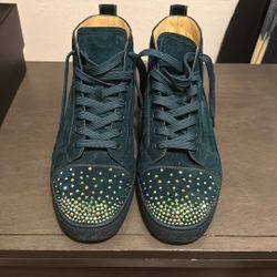 Christian Louboutin "Louis Flat Strass" sneakers in a dark teal suede.