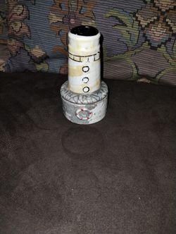             (Light House Trincket)