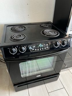 Stoves dishwashers microwaves double stacked washer dryer set.